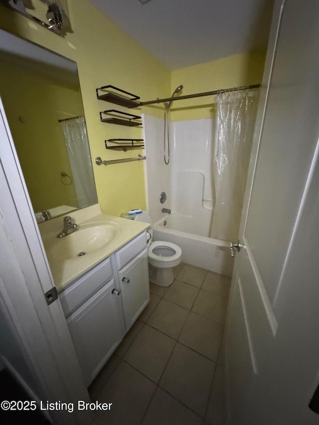 bathroom featuring tile patterned floors, vanity, toilet, and shower / bath combination with curtain