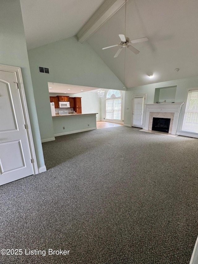 14401 Estate Ridge Blvd, Louisville, KY 40291 - unfurnished living room with high vaulted ceiling, ceiling fan, dark colored carpet, beamed ceiling, and baseboards
