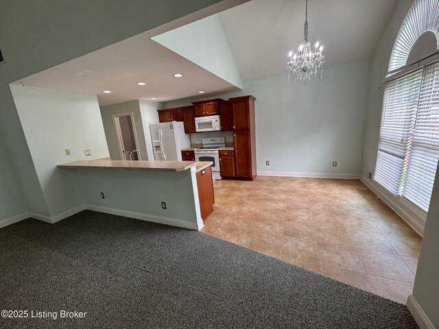 14401 Estate Ridge Blvd, Louisville, KY 40291 - kitchen with white appliances, a chandelier, plenty of natural light, lofted ceiling, and baseboards