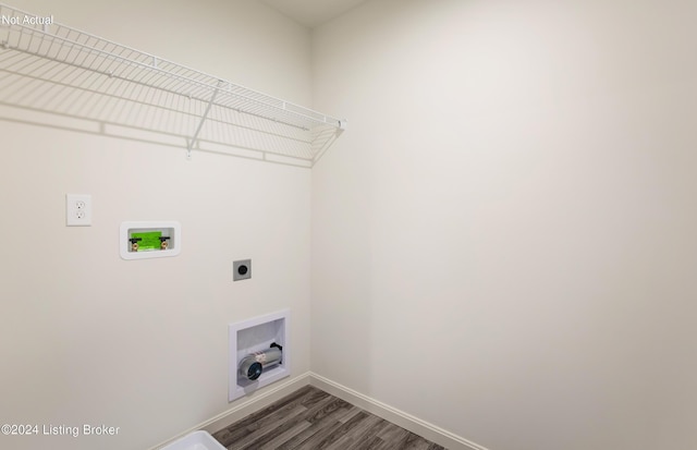 laundry room with washer hookup, hookup for an electric dryer, laundry area, dark wood-style flooring, and baseboards