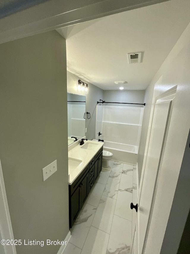 383 Webb Ln, Bedford, KY 40006 - full bath featuring marble look tiles, toilet, double vanity, and bathtub / shower combination