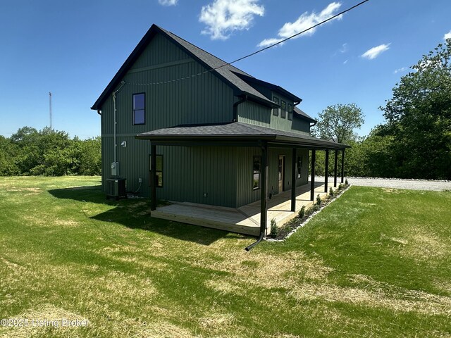 383 Webb Ln, Bedford, KY 40006 - rear view of house with a yard and central air condition unit
