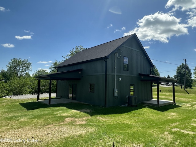 383 Webb Ln, Bedford, KY 40006 - view of property exterior with a lawn, a patio area, and central AC unit