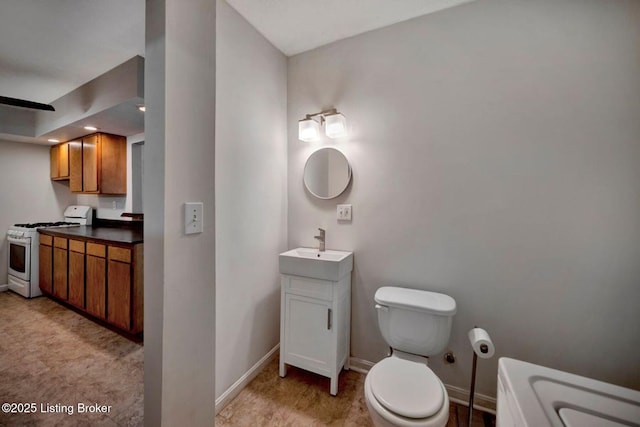 2060 S Preston St, Louisville, KY 40217 - bathroom featuring baseboards, toilet, and vanity
