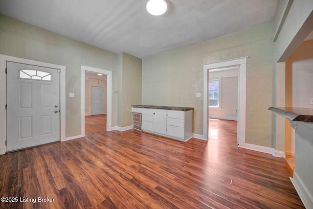 2060 S Preston St, Louisville, KY 40217 - foyer with dark wood-style floors and baseboards