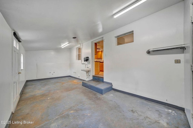 2060 S Preston St, Louisville, KY 40217 - garage featuring baseboards