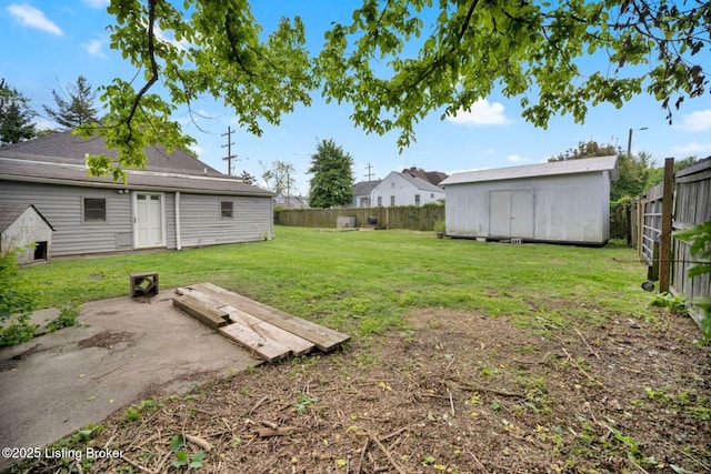 2060 S Preston St, Louisville, KY 40217 - view of yard with an outdoor structure and a storage unit