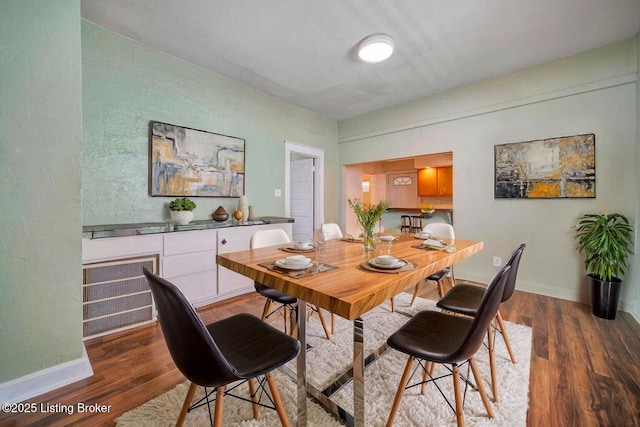 2060 S Preston St, Louisville, KY 40217 - dining space featuring wood finished floors and baseboards
