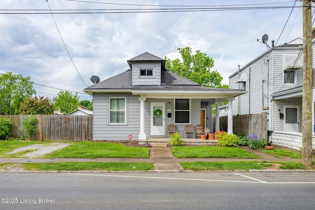 2060 S Preston St, Louisville, KY 40217 - view of front facade featuring covered porch, fence, and roof with shingles