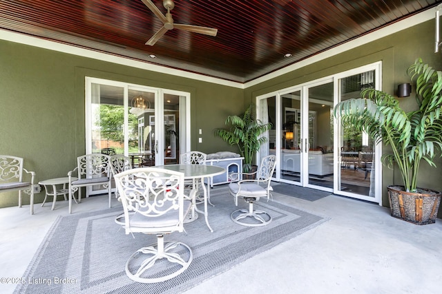 view of patio with ceiling fan and outdoor dining space