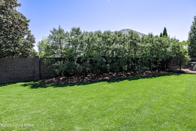 view of yard with fence