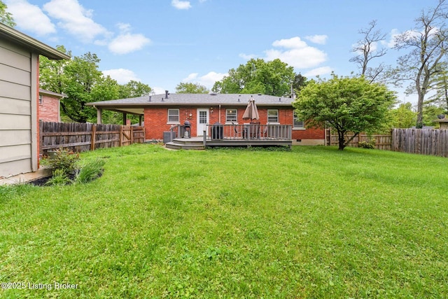 4203 Hewitt Ave, Louisville, KY 40220 - rear view of house featuring a wooden deck, central AC, and brick siding