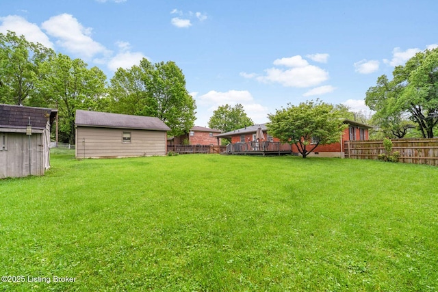 4203 Hewitt Ave, Louisville, KY 40220 - view of yard featuring a storage unit, a wooden deck, and an outbuilding