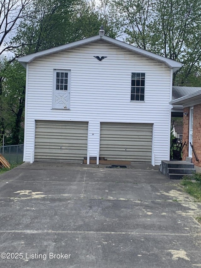 exterior space featuring a garage