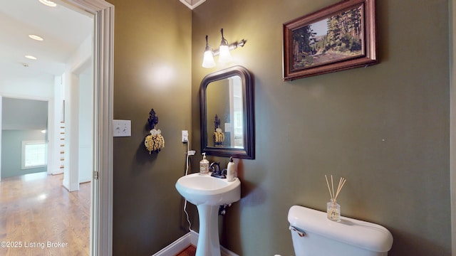 10513 Mountain Ash Ln, Prospect, KY 40059 - bathroom with toilet, wood finished floors, baseboards, and recessed lighting