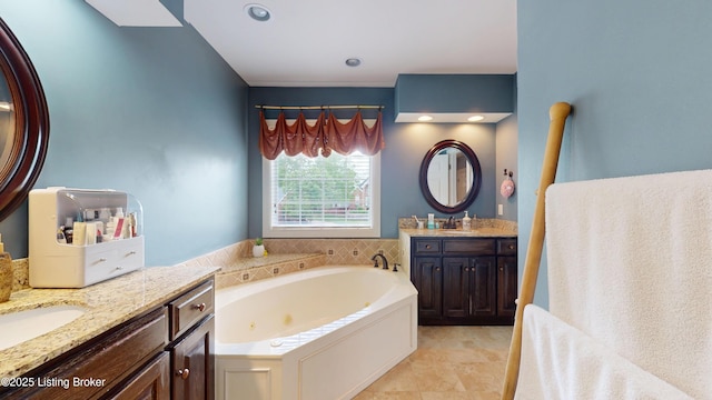 10513 Mountain Ash Ln, Prospect, KY 40059 - bathroom with a jetted tub, two vanities, and tile patterned floors