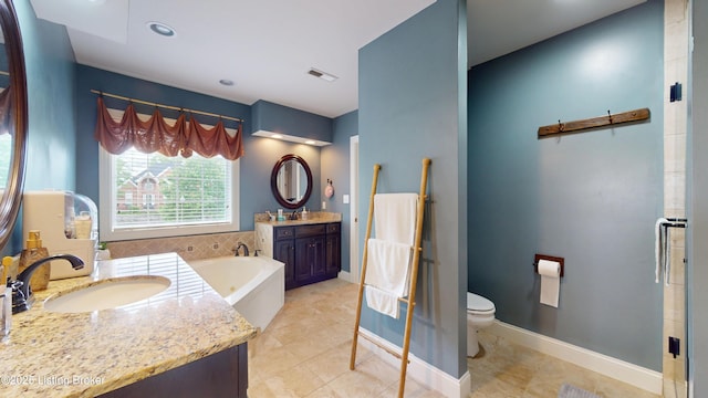 10513 Mountain Ash Ln, Prospect, KY 40059 - full bath with a bath, two vanities, toilet, tile patterned floors, and baseboards