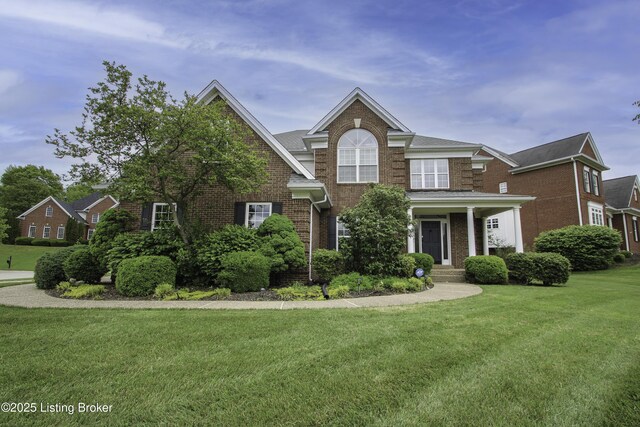 10513 Mountain Ash Ln, Prospect, KY 40059 - traditional-style house with brick siding and a front lawn