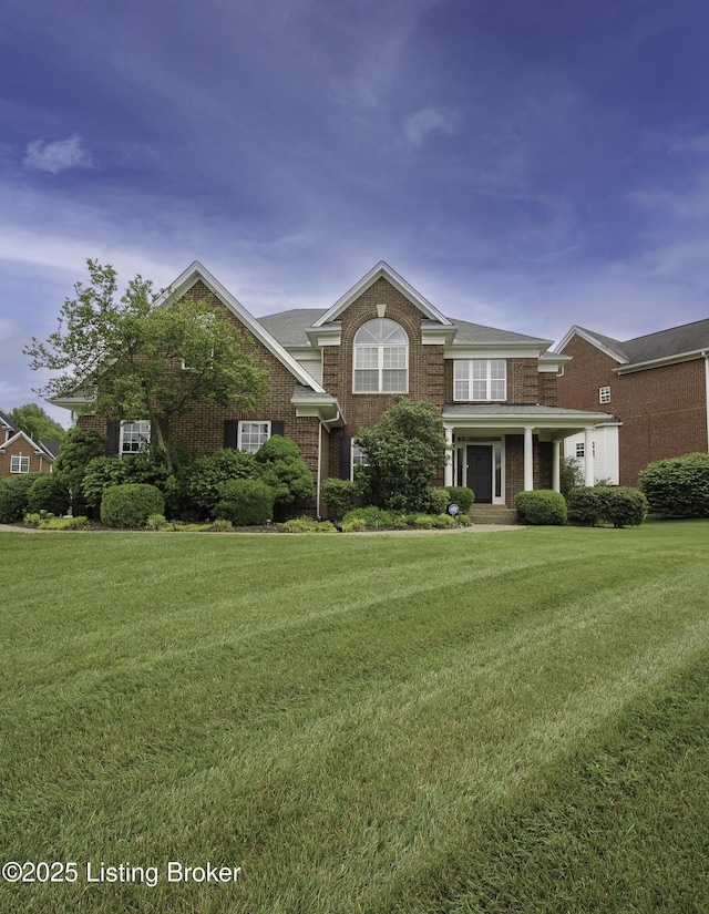 10513 Mountain Ash Ln, Prospect, KY 40059 - traditional-style house with a front yard and brick siding