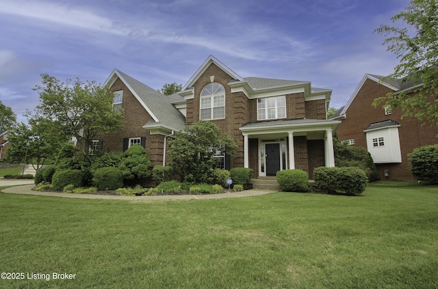10513 Mountain Ash Ln, Prospect, KY 40059 - view of front of property with brick siding, a front yard, and roof with shingles