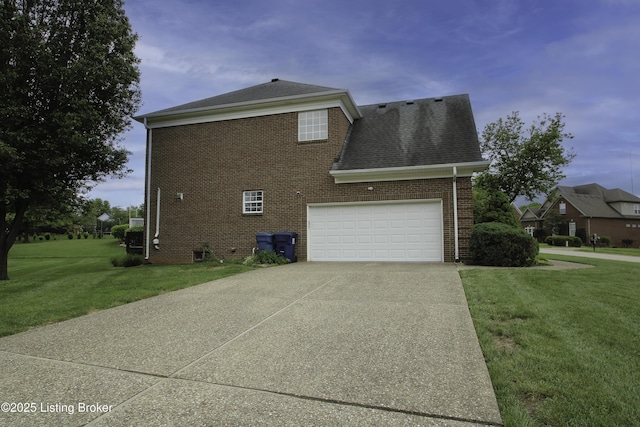 10513 Mountain Ash Ln, Prospect, KY 40059 - view of side of property featuring driveway, a lawn, brick siding, a garage, and a shingled roof