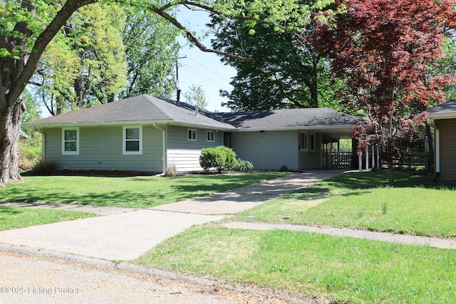 3101 Radiance Rd, Louisville, KY 40220 - ranch-style house featuring driveway, a front lawn, and a carport