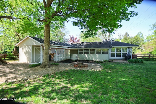 3101 Radiance Rd, Louisville, KY 40220 - rear view of house featuring an outdoor structure and a storage shed