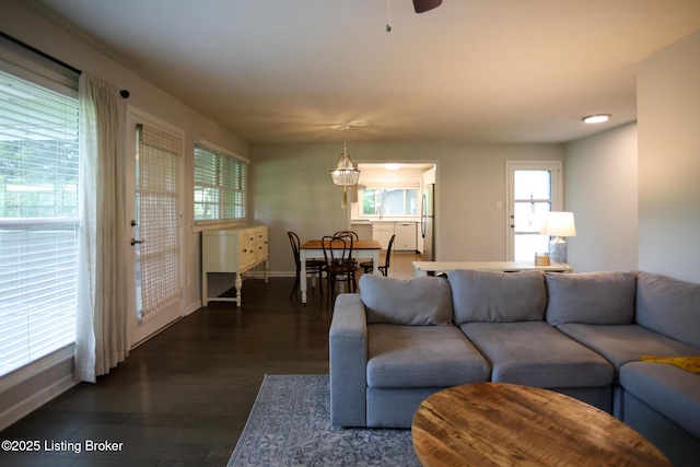 3101 Radiance Rd, Louisville, KY 40220 - living area featuring baseboards, dark wood finished floors, and a ceiling fan
