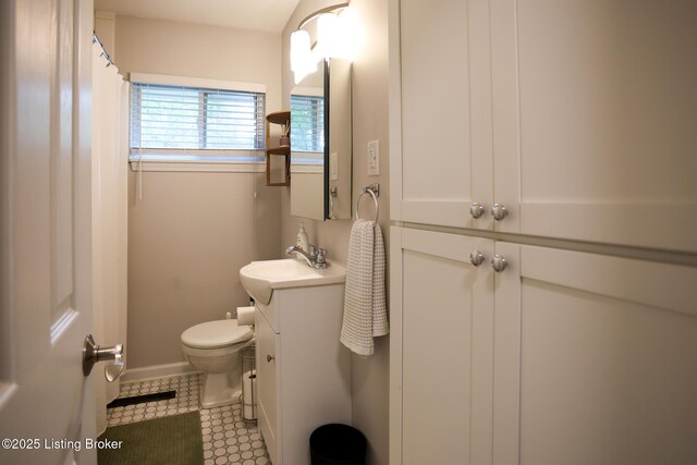 3101 Radiance Rd, Louisville, KY 40220 - full bathroom featuring toilet, vanity, and tile patterned flooring