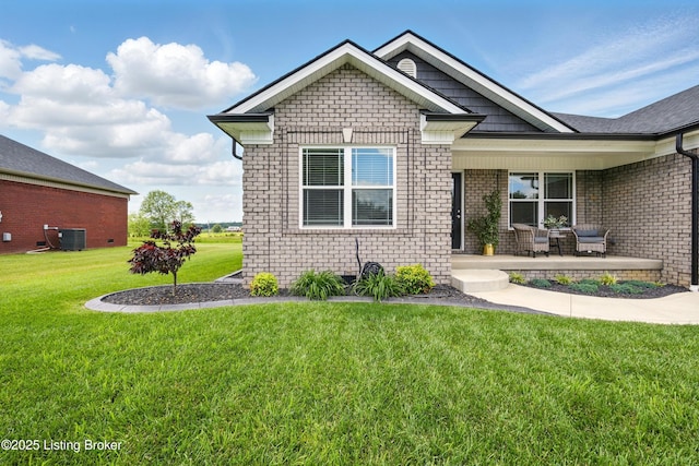 105 Hollow Springs Dr, Bardstown, KY 40004 - view of front of home featuring cooling unit, a front yard, covered porch, and brick siding