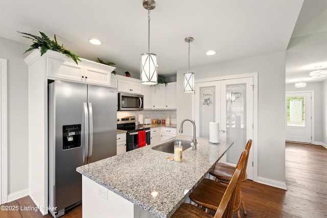 105 Hollow Springs Dr, Bardstown, KY 40004 - kitchen with stainless steel appliances, a sink, white cabinets, dark wood-type flooring, and recessed lighting
