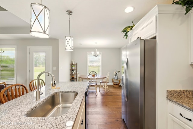 105 Hollow Springs Dr, Bardstown, KY 40004 - kitchen featuring stainless steel fridge, a sink, white cabinets, pendant lighting, and dark wood-style flooring