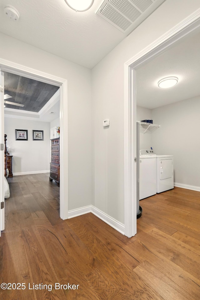 105 Hollow Springs Dr, Bardstown, KY 40004 - corridor with wood finished floors, washing machine and dryer, and baseboards