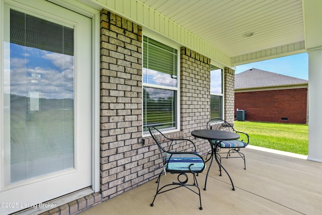 105 Hollow Springs Dr, Bardstown, KY 40004 - covered porch featuring cooling unit and a lawn