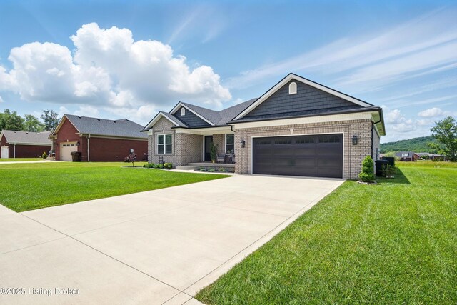 105 Hollow Springs Dr, Bardstown, KY 40004 - view of front of house featuring a front lawn, an attached garage, brick siding, and driveway