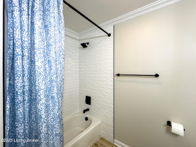 bathroom with crown molding, shower / tub combo with curtain, and wood finished floors