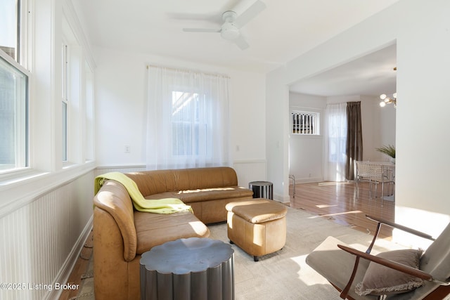 1245 S 7th St, Louisville, KY 40203 - living area featuring wainscoting and a ceiling fan