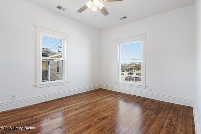 1245 S 7th St, Louisville, KY 40203 - spare room with hardwood / wood-style floors, a ceiling fan, and baseboards