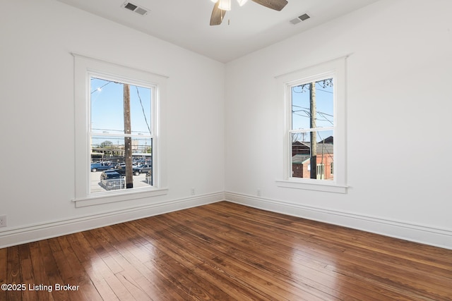 1245 S 7th St, Louisville, KY 40203 - spare room featuring hardwood / wood-style flooring, a ceiling fan, and baseboards