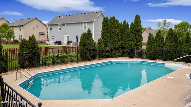 view of pool featuring a fenced in pool and fence