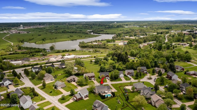 birds eye view of property featuring a water view and a residential view