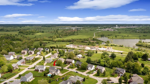 bird's eye view featuring a water view and a residential view