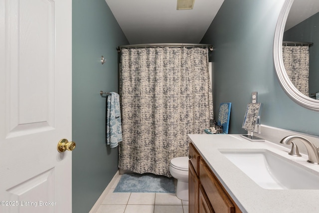 bathroom featuring toilet, tile patterned floors, vanity, and visible vents