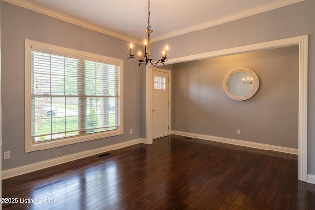 unfurnished room with a chandelier, plenty of natural light, baseboards, dark wood-style flooring, and ornamental molding