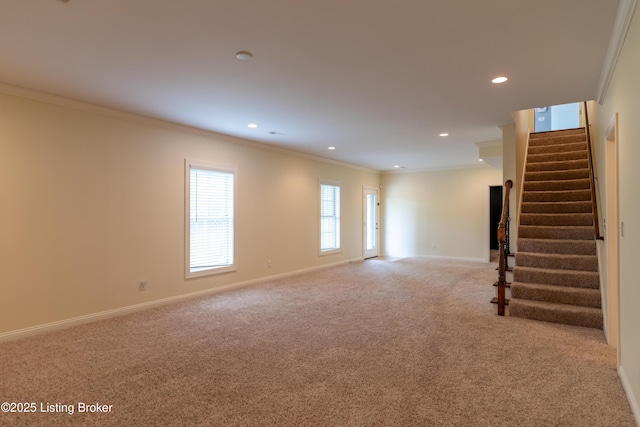 unfurnished living room featuring ornamental molding, carpet flooring, stairway, recessed lighting, and baseboards