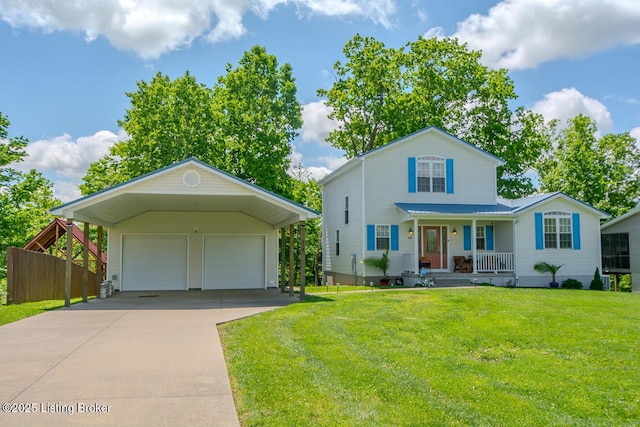 view of front of property featuring a detached garage, covered porch, a front lawn, and an outbuilding