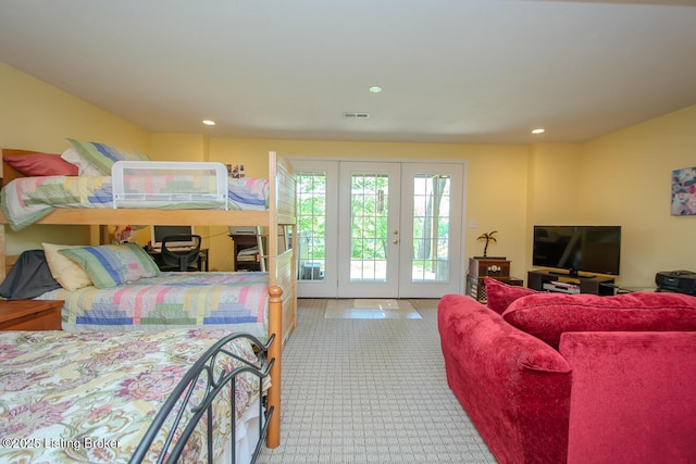 bedroom with access to outside, french doors, and recessed lighting