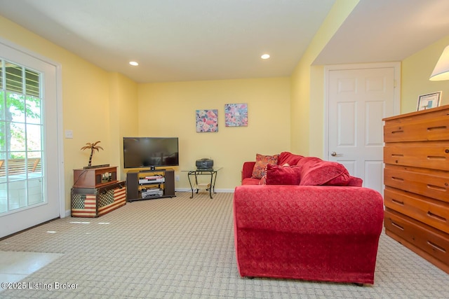 carpeted living room with baseboards and recessed lighting