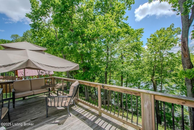 wooden deck featuring an outdoor living space