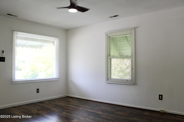 3023 Saint Dennis Ave, Louisville, KY 40216 - spare room with ceiling fan, visible vents, and dark wood finished floors